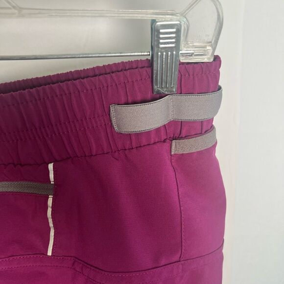 Asics Women's Magenta Athletic Shorts - Picture 4 of 14